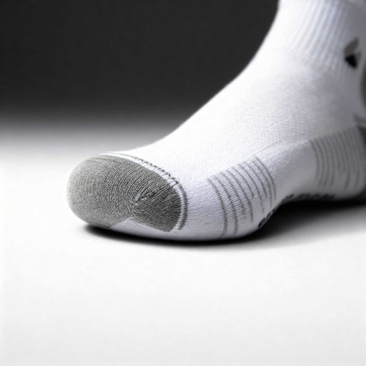 White and grey ankle running socks with moisture-wicking fabric and seamless toe design