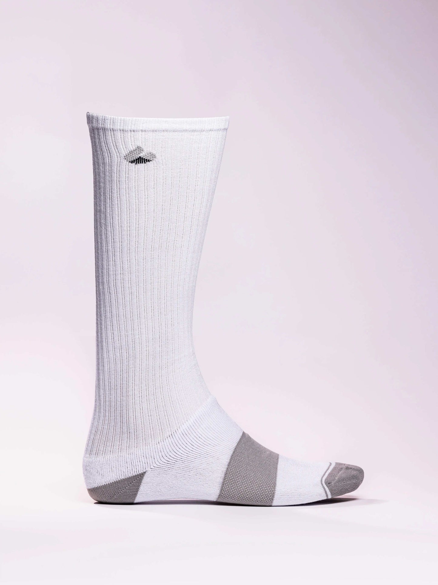 Compression socks in white and grey with targeted support for athletes.